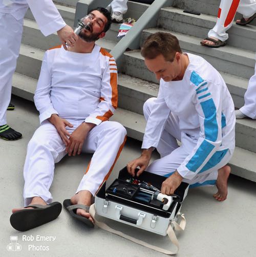 Narkina doctor attending to an injured fellow prisoner